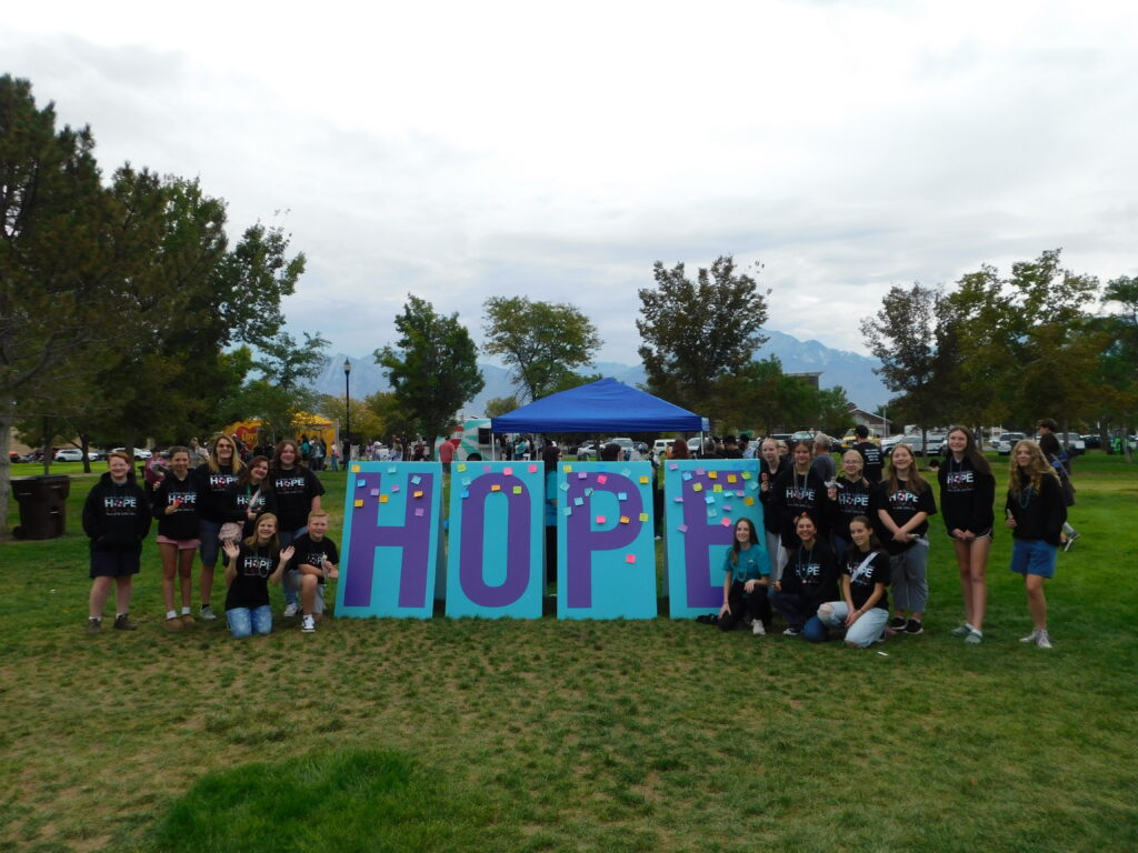 Students with Hope sign